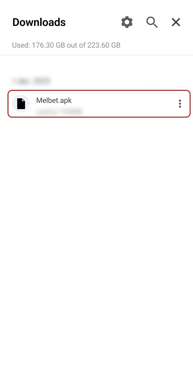 Find the downloaded APK file within your official Melbet folder.